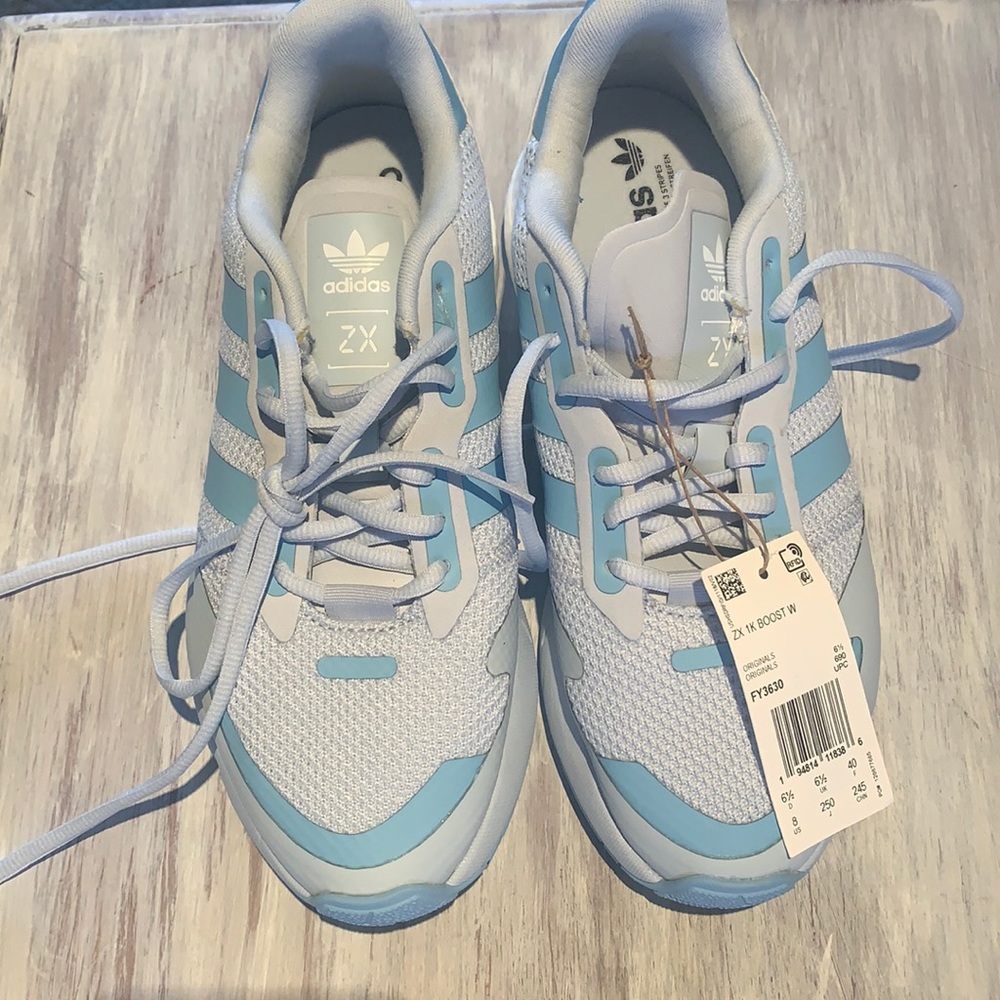 Baby blue adidas size 8